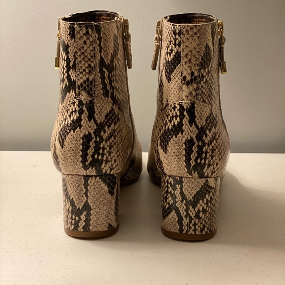 Size 9 Cole Haan sightly textured snake skin booties with gold accents. - Picture 2 of 6